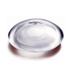 Single round silicone breast implant shown from above